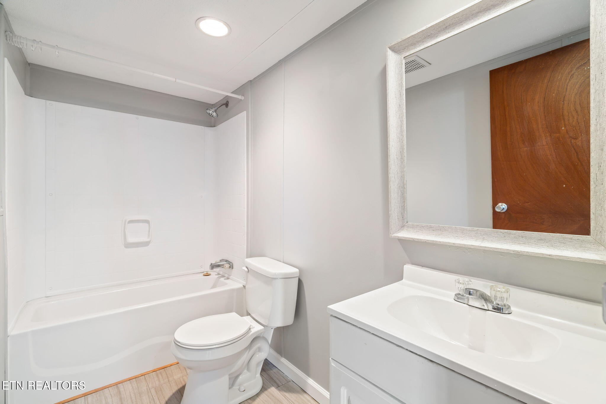 361 Doane Road New Market, TN 37820 - Photo 26 of 39 a bathroom with a sink toilet and shower