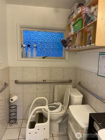 a bathroom with a toilet and a sink