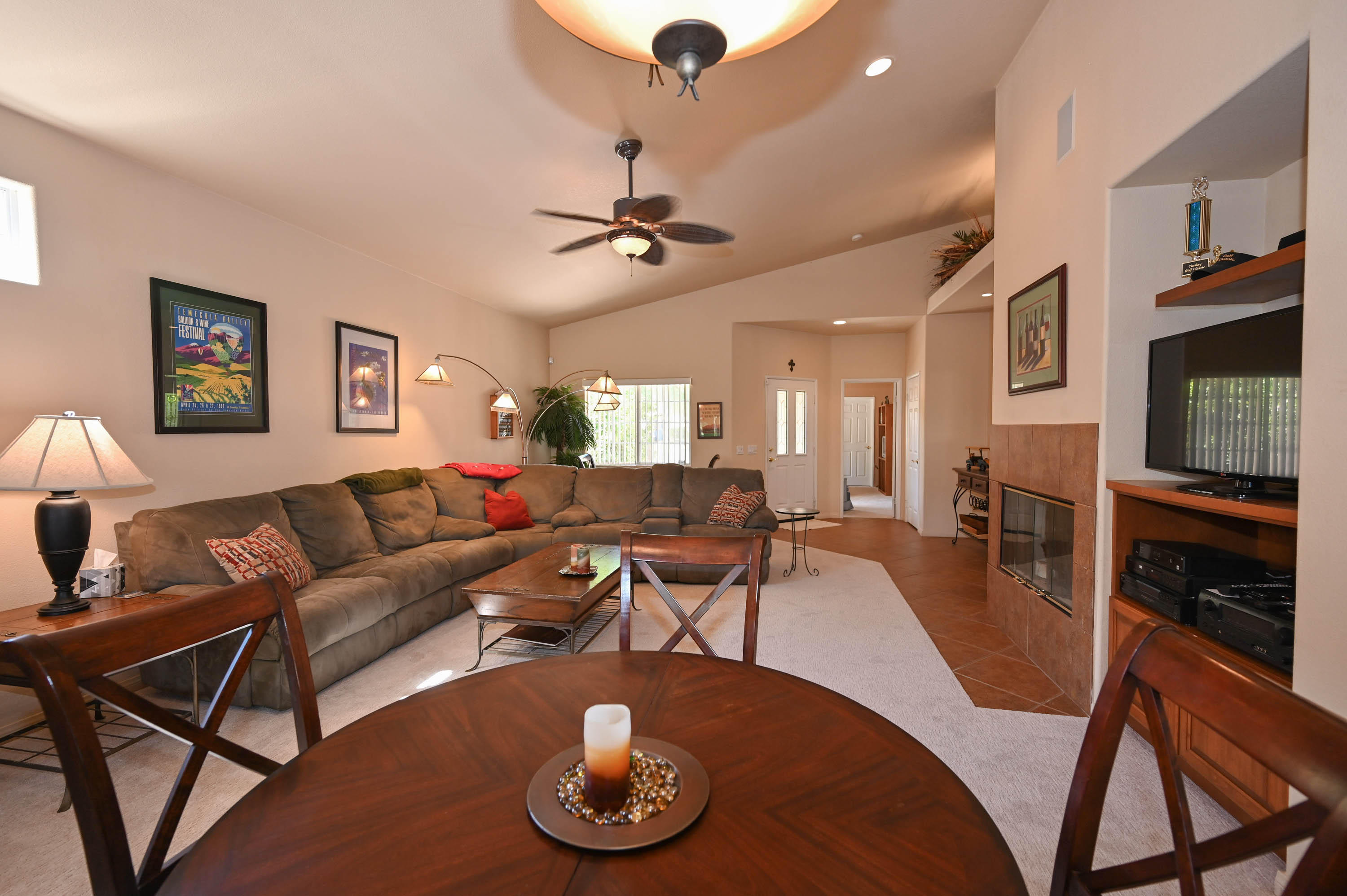 45204 Banff Springs Street Indio, CA 92201 - Photo 25 of 36 a living room with furniture and a wooden floor
