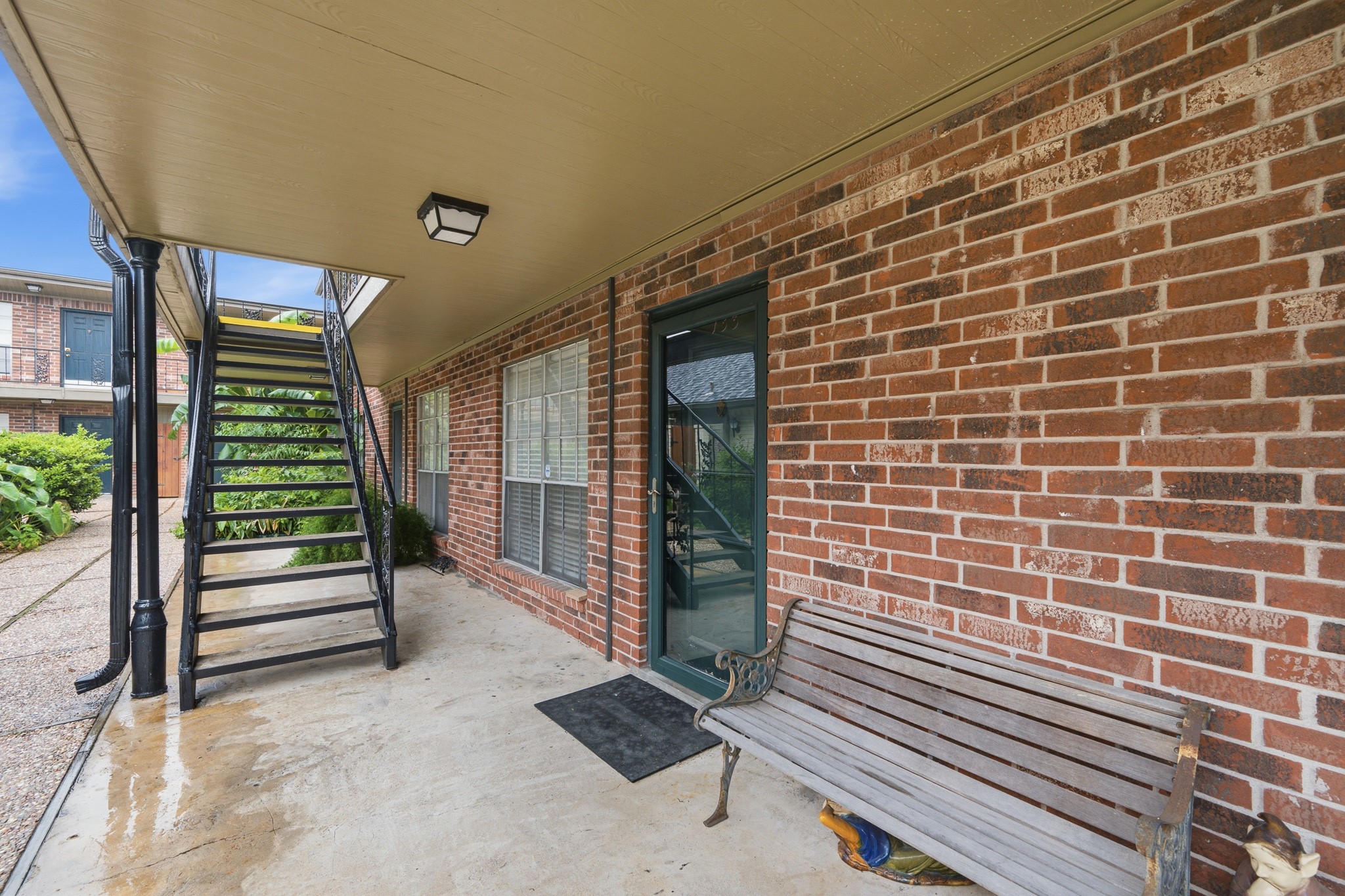 11550 Chimney Rock Road, Unit 133 Houston, TX 77035 - Photo 3 of 40 Charming brick exterior with a welcoming porch area.