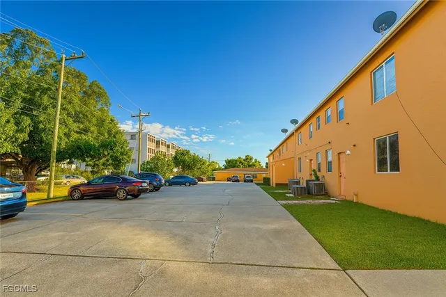 a view of a street with cars