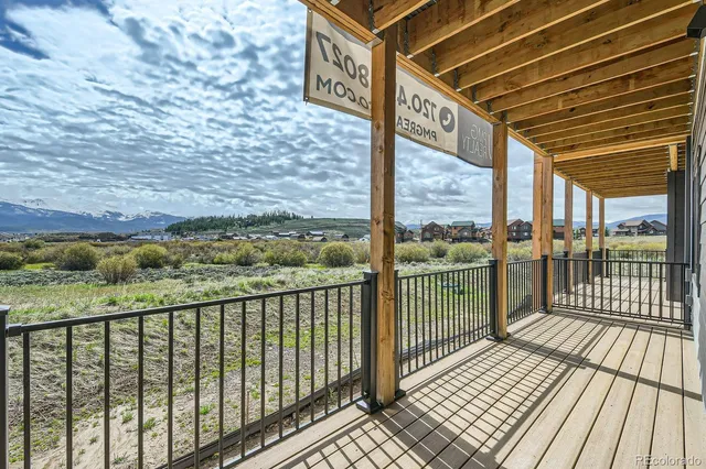 a view of a street from a balcony