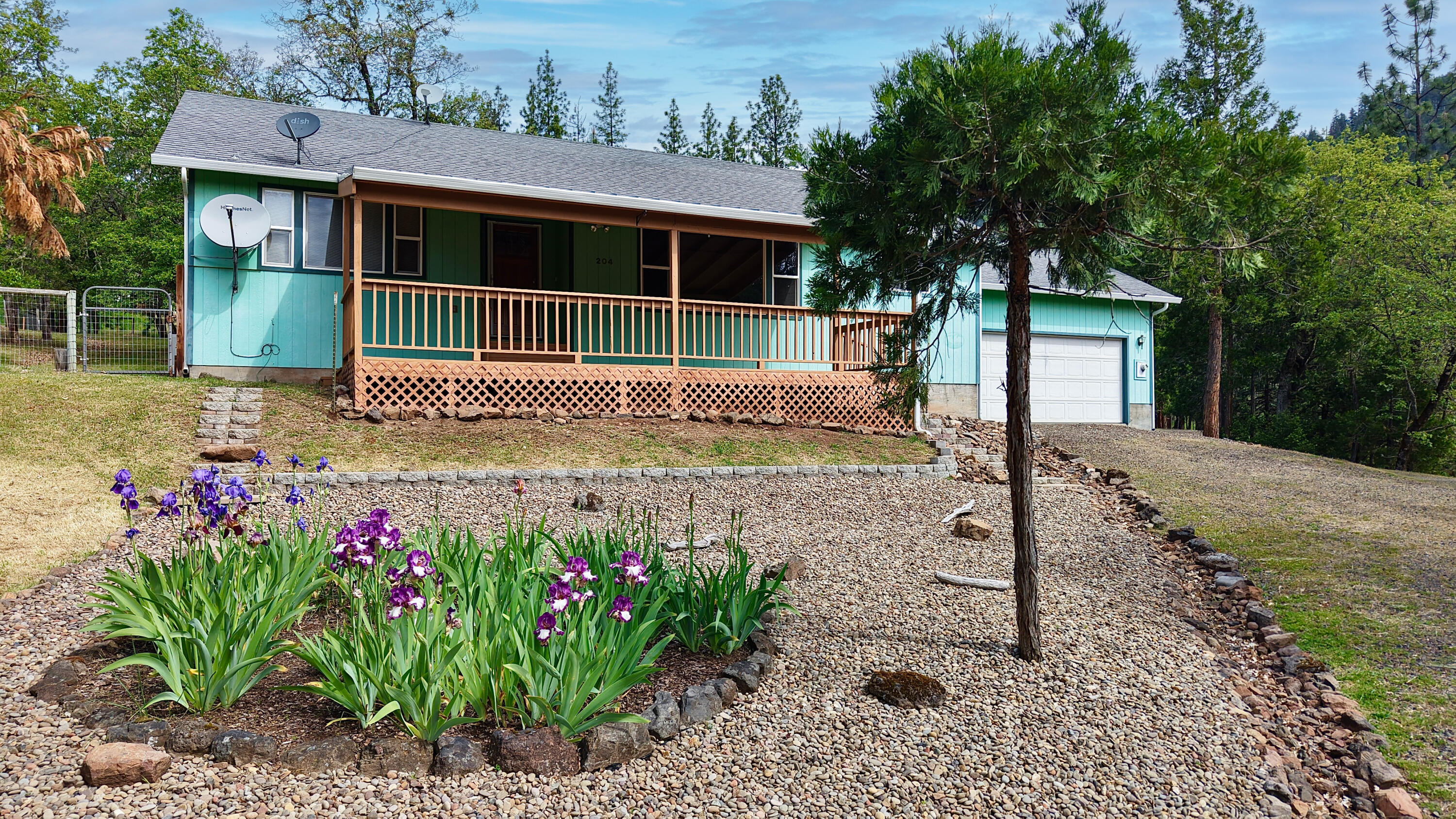 204 Shipley Terrace Prospect, OR 97536 - Photo 2 of 61 a house with a trees in the background