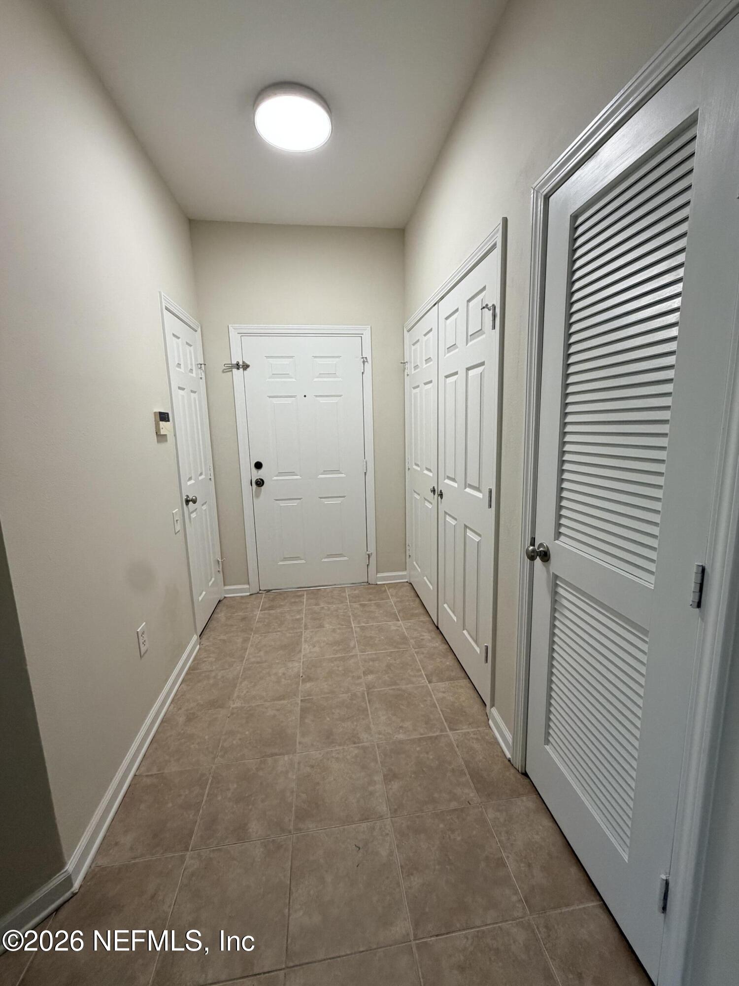 7990 Baymeadows Road East, Unit 1111 Jacksonville, FL 32256 - Photo 8 of 25 entry hall