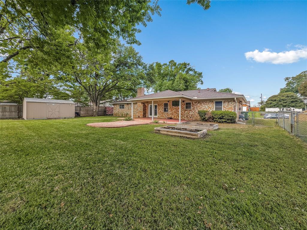 220 Cooper Drive Hurst, TX 76053 - Photo 1 of 27 a view of a house with a big yard