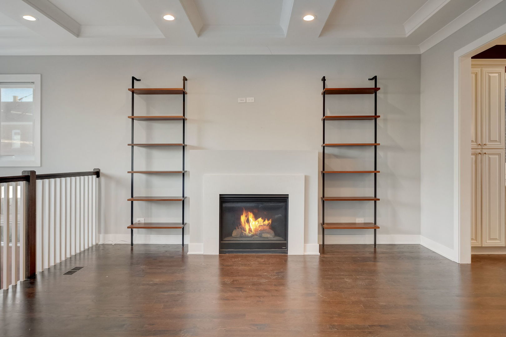 3303 South Racine Avenue Chicago, IL 60608 - Photo 16 of 60 a view of a livingroom with wooden floor and a fireplace