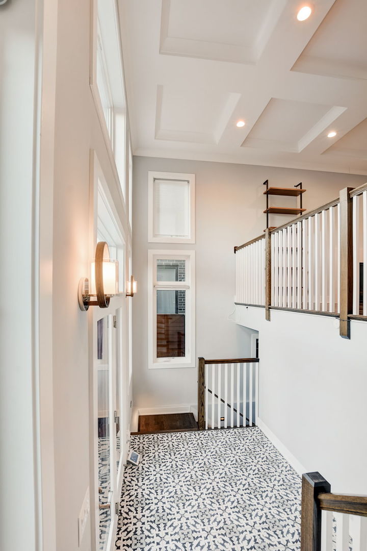 3303 South Racine Avenue Chicago, IL 60608 - Photo 35 of 60 a view of a hallway with wooden floor and staircase