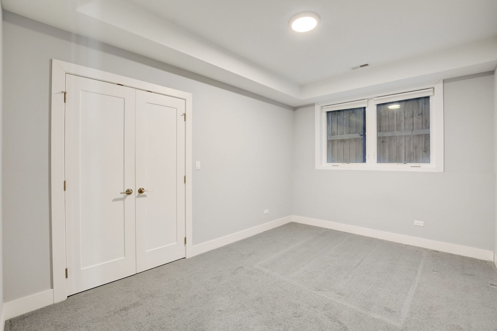 3303 South Racine Avenue Chicago, IL 60608 - Photo 44 of 60 a view of an empty room with a window