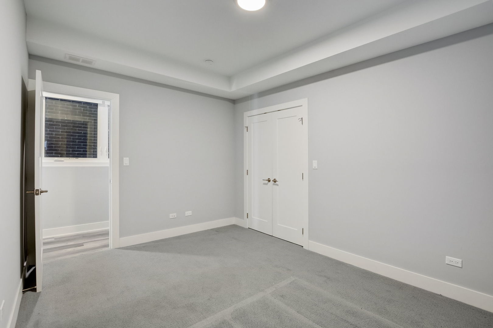 3303 South Racine Avenue Chicago, IL 60608 - Photo 45 of 60 an empty room with windows