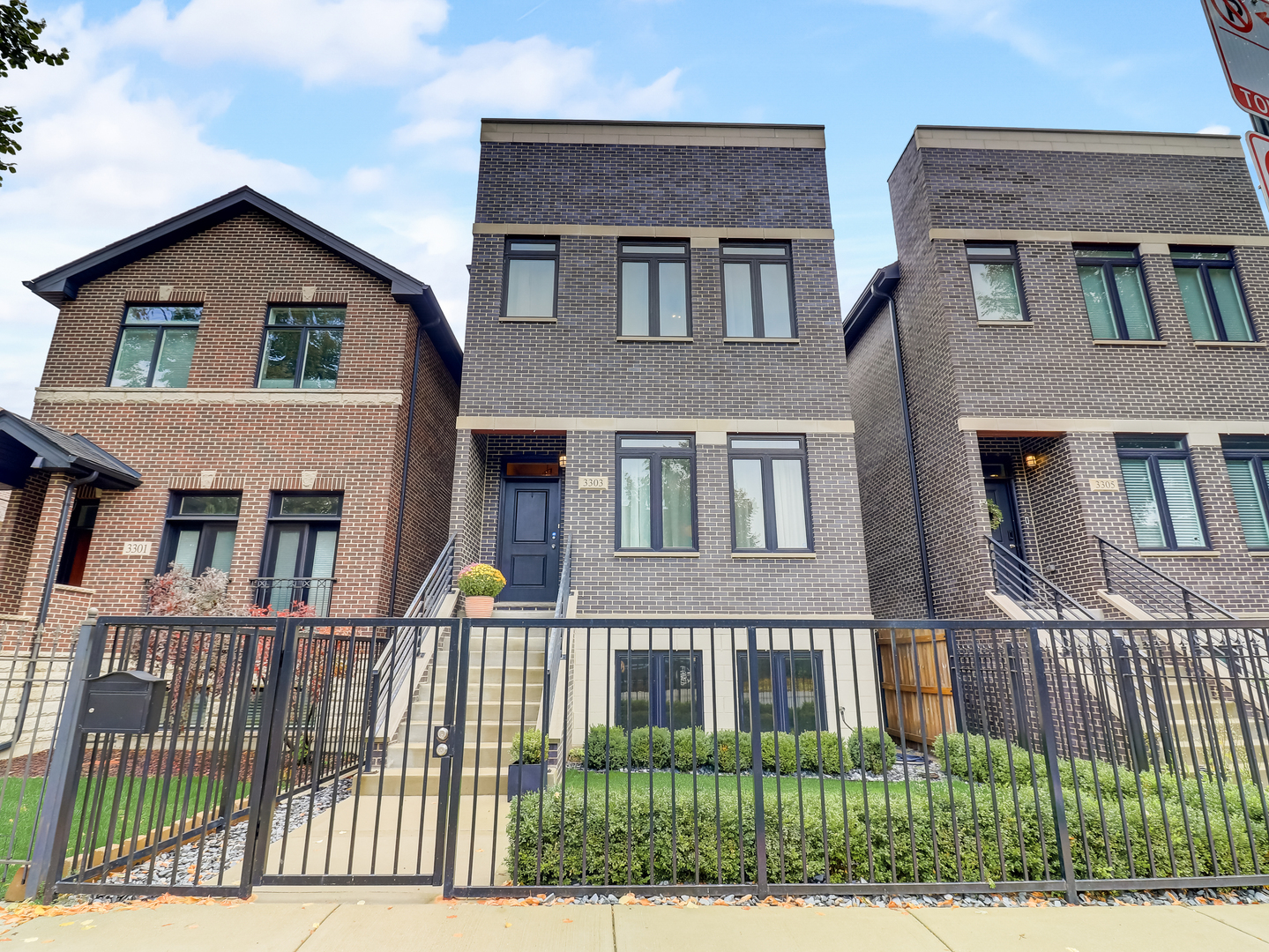 3303 South Racine Avenue Chicago, IL 60608 - Photo 60 of 60 front view of a house with a balcony