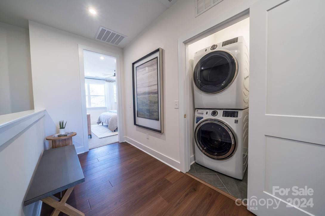 2055 Evolve Way Charlotte, NC 28205 - Photo 31 of 40 a view of a hallway with washer and dryer
