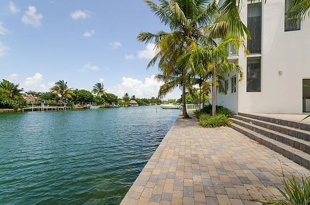 a house with garden in front of it