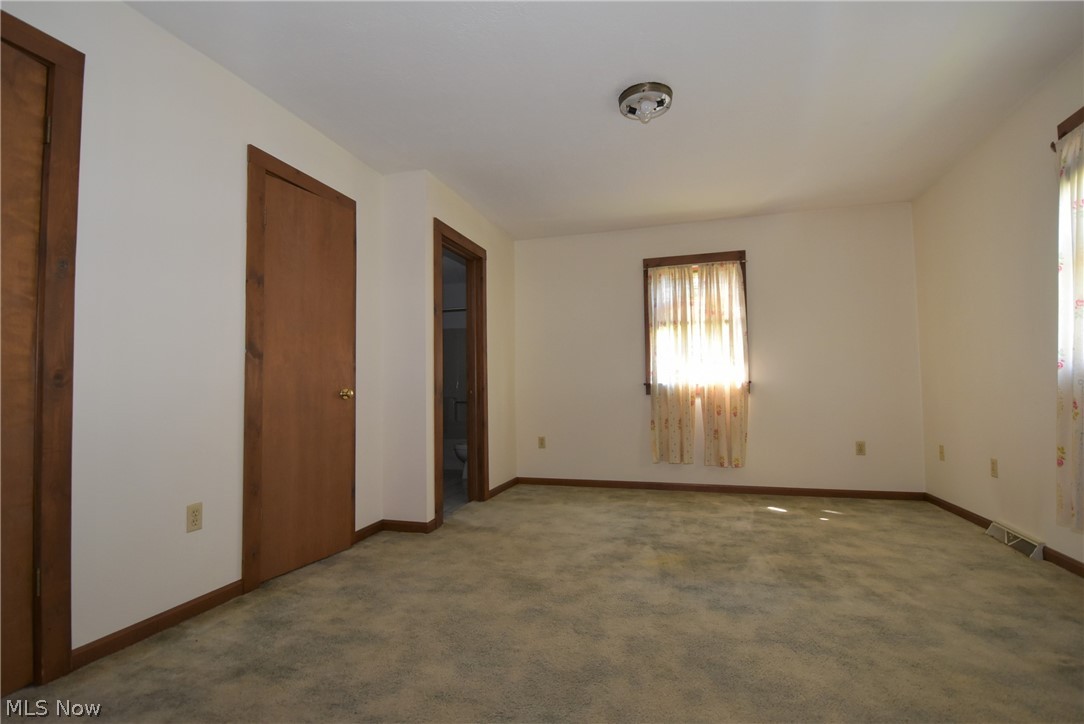 1460 Ohltown Girard Road Mineral Ridge, OH 44440 - Photo 14 of 18 Master Bedroom with walk in closets