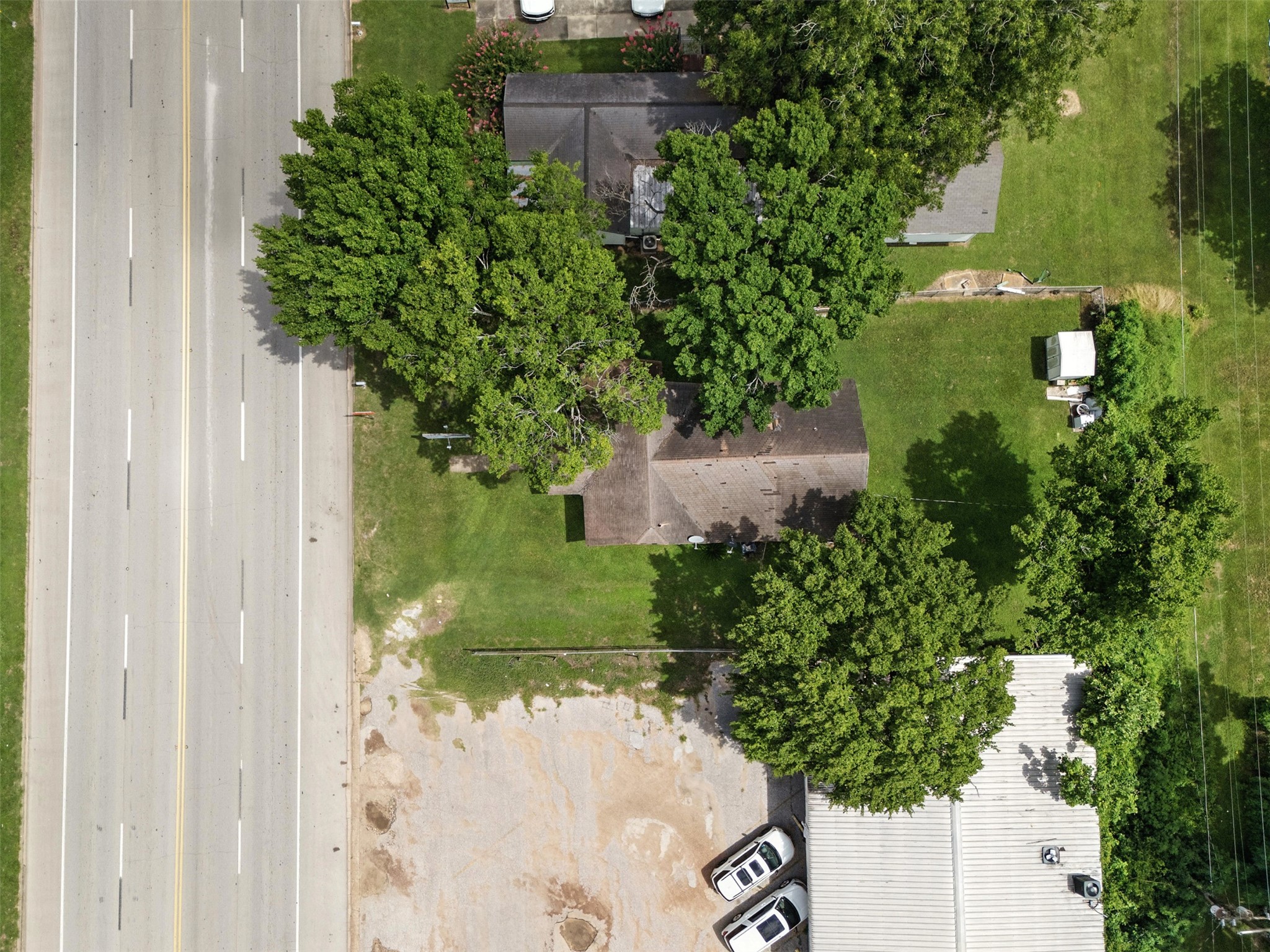 619 10th Street Hempstead, TX 77445 - Photo 20 of 27 a view of a garden with a fountain