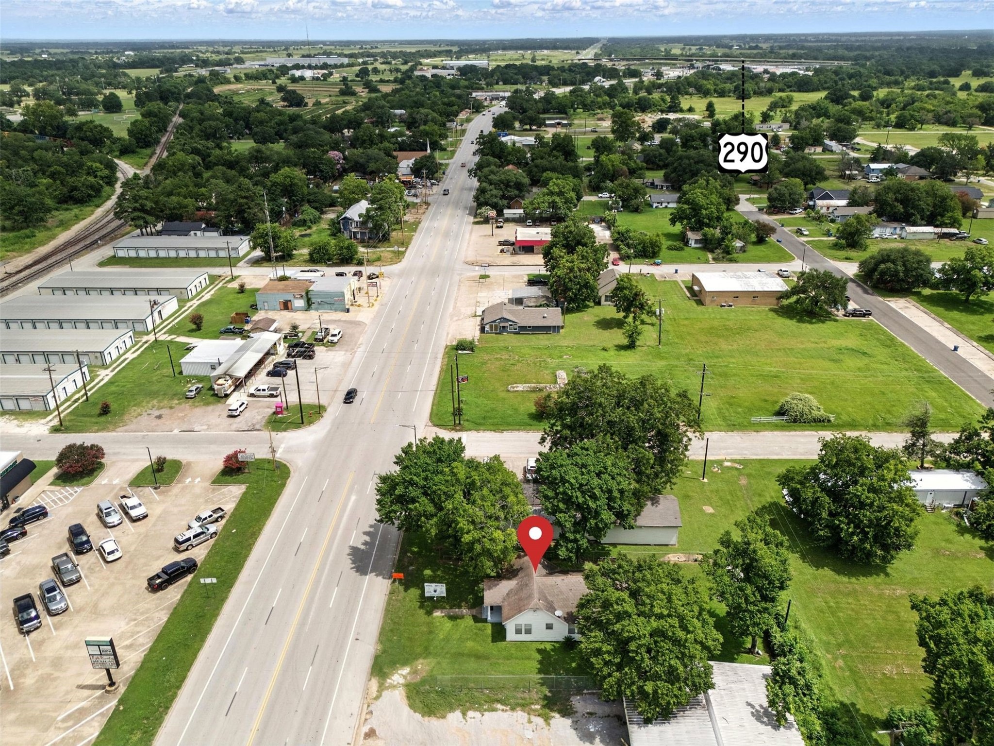 619 10th Street Hempstead, TX 77445 - Photo 21 of 27 a view of a city with tall buildings