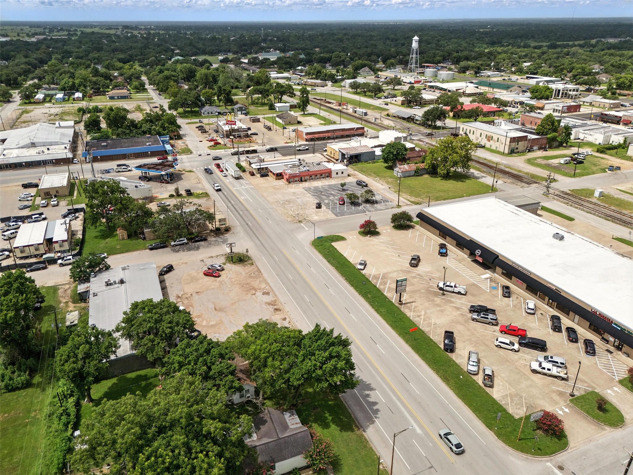619 10th Street Hempstead, TX 77445 - Photo 23 of 27 a picture of city view with lot of trees