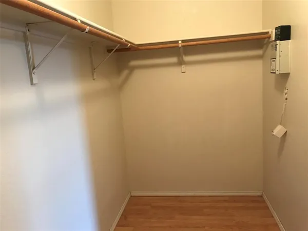 a bathroom with a shower and a toilet