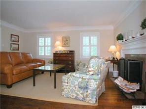 522 Ellsworth Road Charlotte, NC 28211 - Photo 6 of 16 a living room with furniture and a fireplace