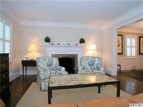 522 Ellsworth Road Charlotte, NC 28211 - Photo 7 of 16 a living room with furniture and a fireplace