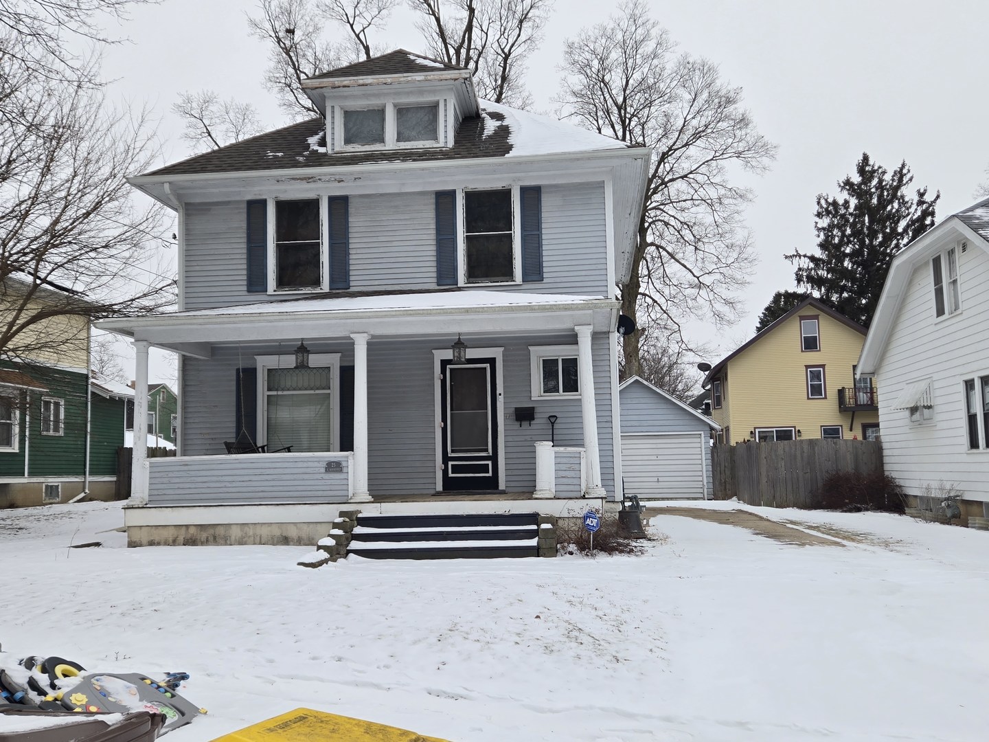 25 East Roosevelt Street Freeport, IL 61032 - Photo 1 of 1 a view of a house with a snow in the road