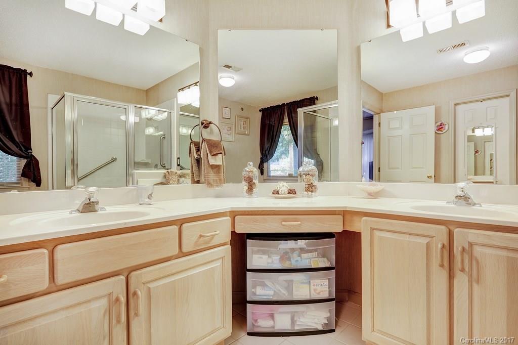 113 Banks Ridge Road Fort Mill, SC 29715 - Photo 13 of 21 a bathroom with a sink and a mirror