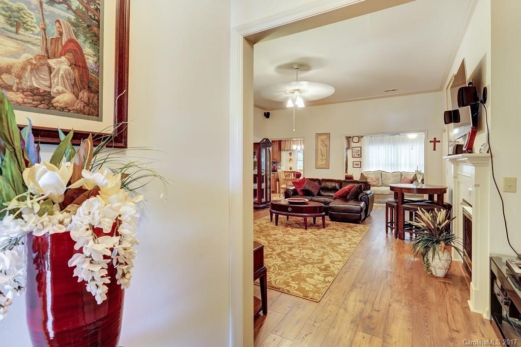 113 Banks Ridge Road Fort Mill, SC 29715 - Photo 3 of 21 a view of a dining room with furniture and a kitchen