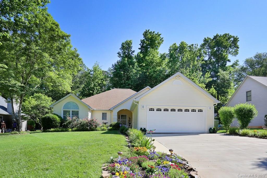 113 Banks Ridge Road Fort Mill, SC 29715 - Photo 21 of 21 a view of house with garden and tall tress