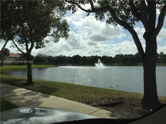 a view of a lake from a yard