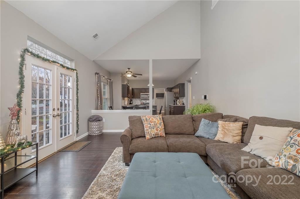 7201 Reedy Creek Road Charlotte, NC 28215 - Photo 16 of 30 a living room with furniture and wooden floor