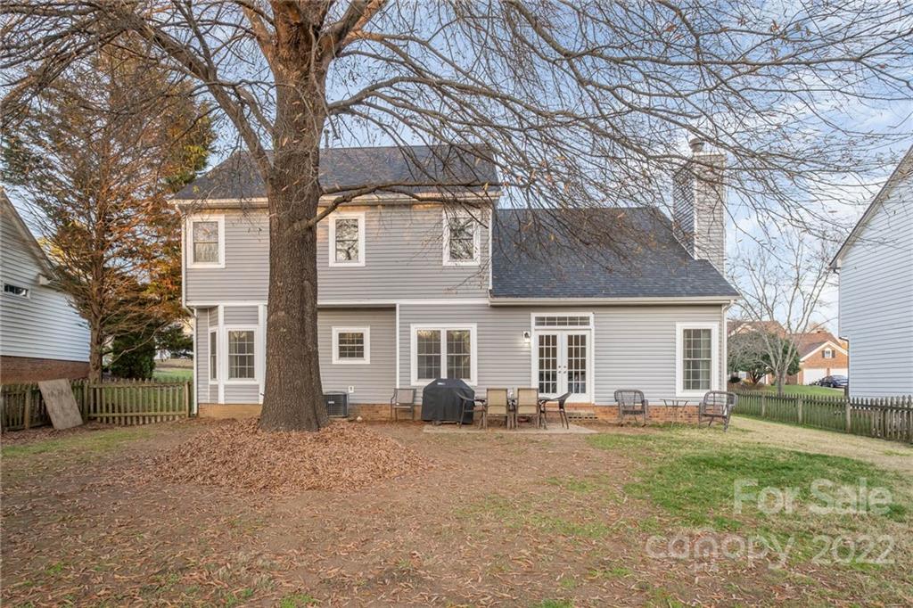 7201 Reedy Creek Road Charlotte, NC 28215 - Photo 29 of 30 a front view of house with yard and trees around