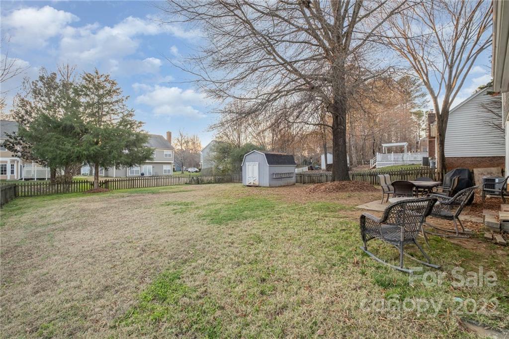 7201 Reedy Creek Road Charlotte, NC 28215 - Photo 30 of 30 a view of a yard with table and chairs