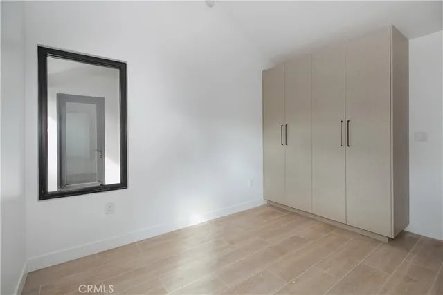 a view of a house with a snow in the backyard