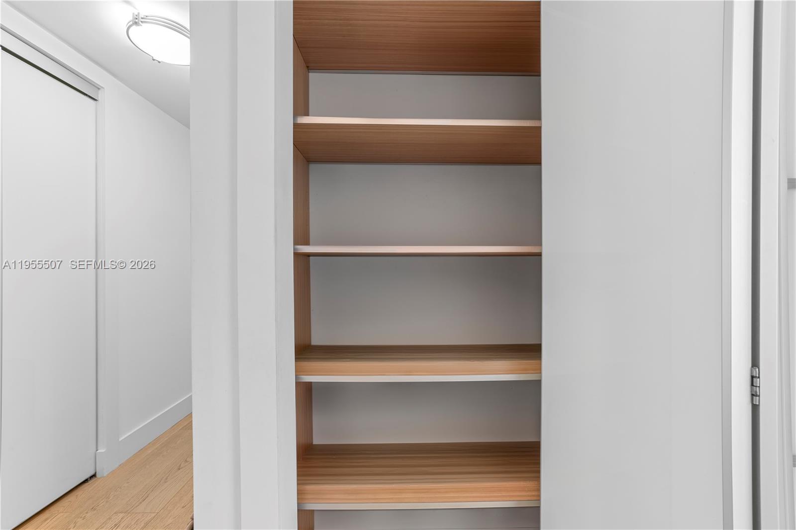 92 Southwest 3rd Street, Unit 1201 Miami, FL 33130 - Photo 27 of 31 a close view of closet