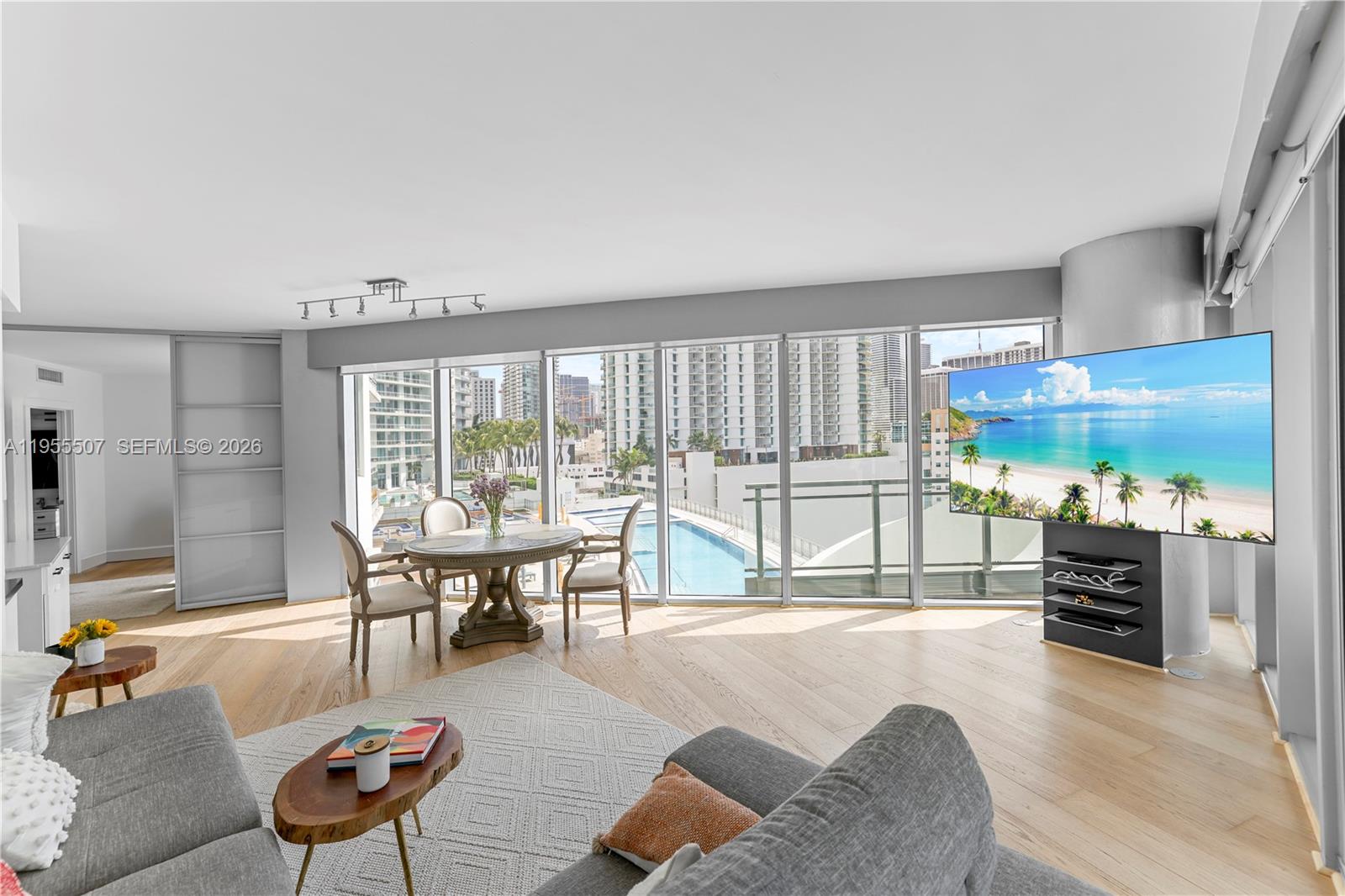 92 Southwest 3rd Street, Unit 1201 Miami, FL 33130 - Photo 3 of 31 a living room with furniture and a large window