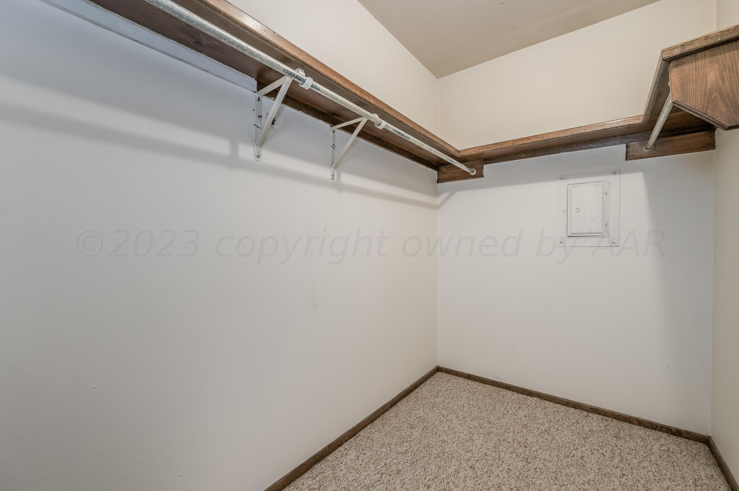 4502 Harvard Street Amarillo, TX 79109 - Photo 16 of 26 a view of a room with rack on the wall