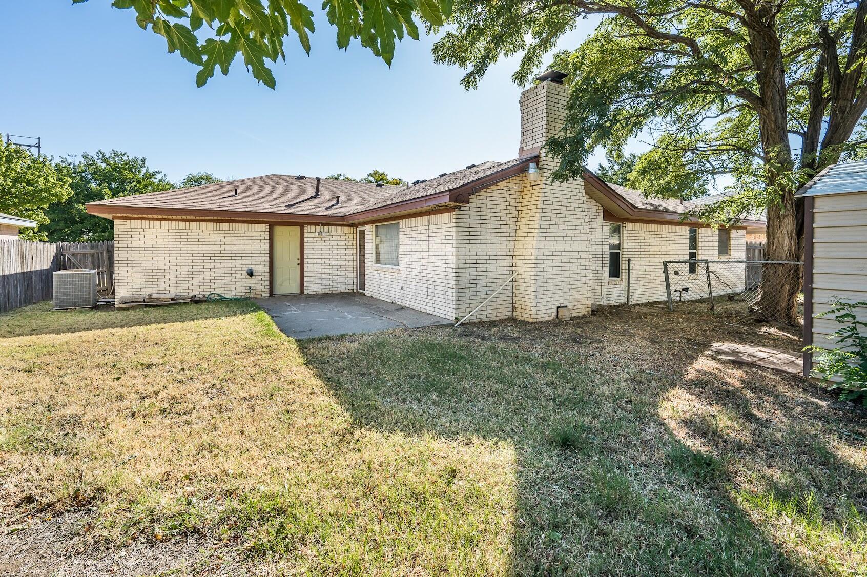 4502 Harvard Street Amarillo, TX 79109 - Photo 24 of 26 front view of a house with a yard