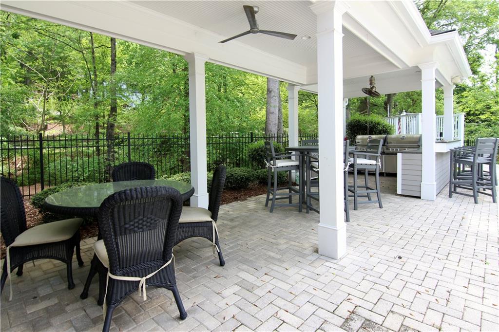 6380 River Chase Circle Northwest Sandy Springs, GA 30328 - Photo 17 of 25 a view of a porch with furniture and a yard