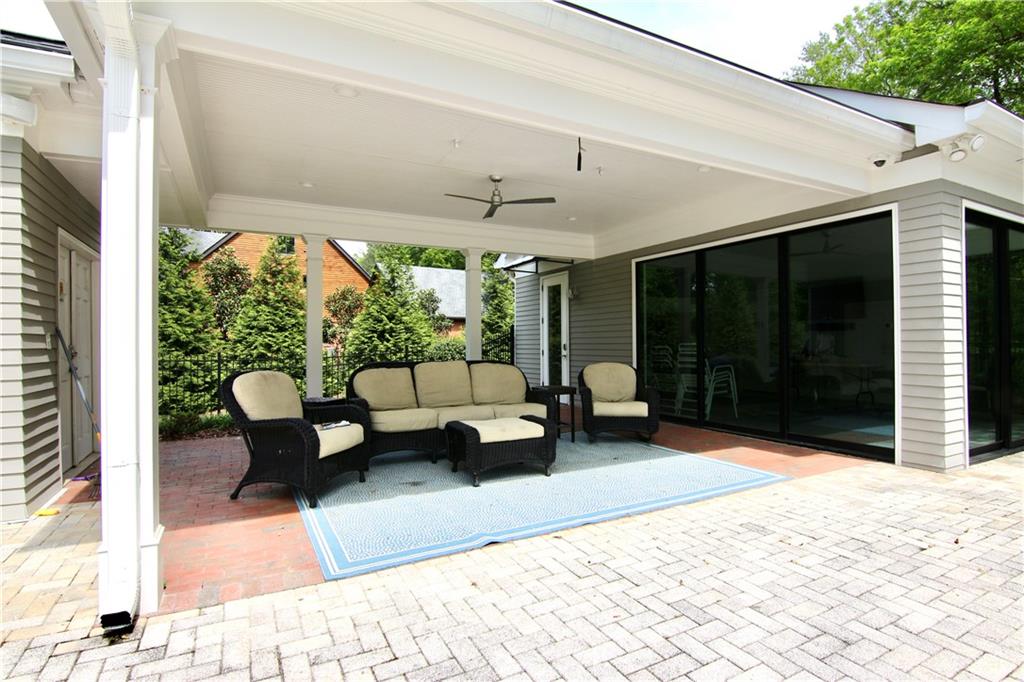 6380 River Chase Circle Northwest Sandy Springs, GA 30328 - Photo 18 of 25 a building outdoor space with patio furniture and potted plants