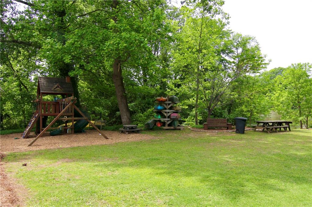 6380 River Chase Circle Northwest Sandy Springs, GA 30328 - Photo 21 of 25 a view of a backyard with swimming pool