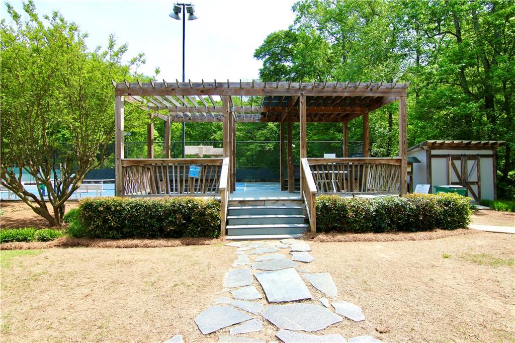 6380 River Chase Circle Northwest Sandy Springs, GA 30328 - Photo 23 of 25 a front view of a house with a yard