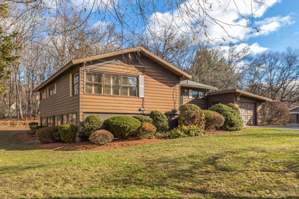 9 Wheeler Road Lexington, MA 02420 - Photo 2 of 30 a front view of a house with garden