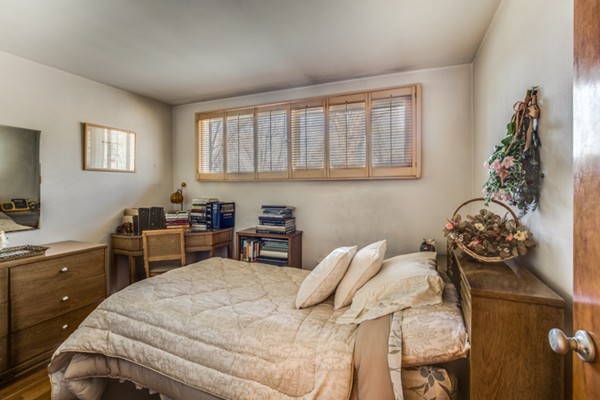 9 Wheeler Road Lexington, MA 02420 - Photo 22 of 30 a bedroom with a bed and a window