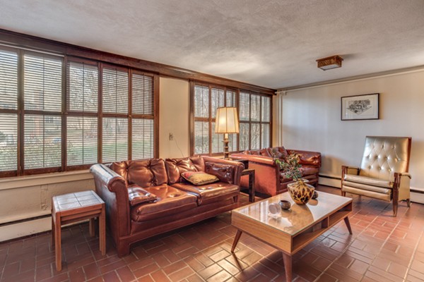 9 Wheeler Road Lexington, MA 02420 - Photo 26 of 30 a living room with furniture and a floor to ceiling window