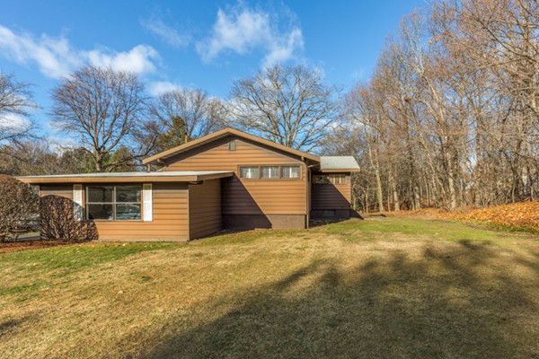 9 Wheeler Road Lexington, MA 02420 - Photo 29 of 30 a house with trees in the background