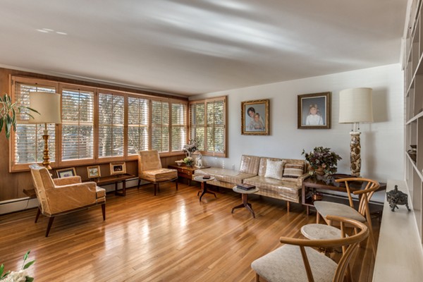 9 Wheeler Road Lexington, MA 02420 - Photo 5 of 30 a living room with furniture and floor to ceiling windows