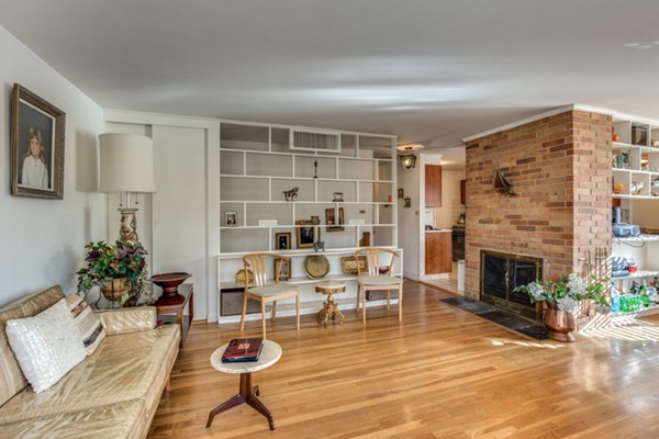 9 Wheeler Road Lexington, MA 02420 - Photo 8 of 30 a living room with furniture and a fireplace
