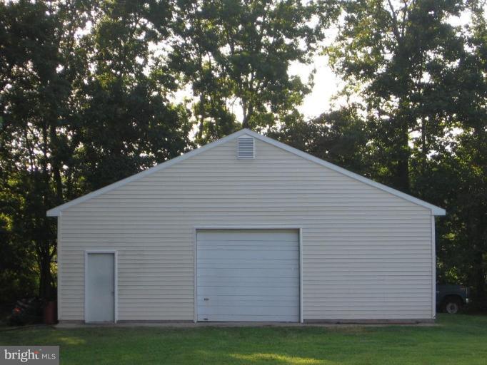 4325 Dunn Road Huntingtown, MD 20639 - Photo 2 of 23 a backyard of a house