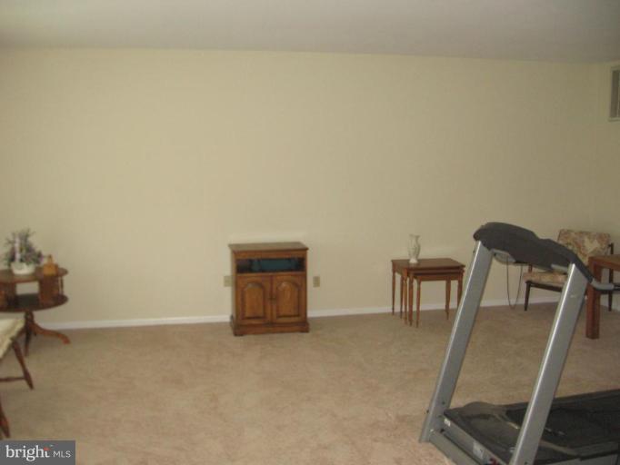 4325 Dunn Road Huntingtown, MD 20639 - Photo 23 of 23 a view of a room with table and chair