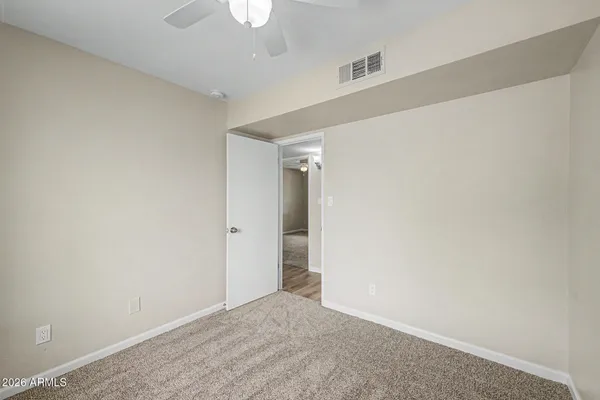 a bathroom with a sink a mirror and a shower