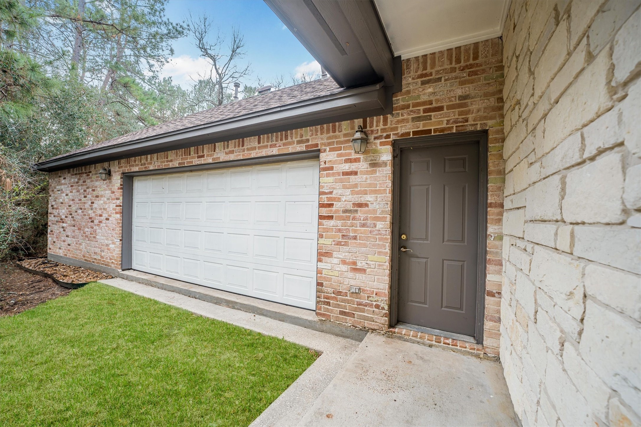 111 Whispering Meadow Magnolia, TX 77355 - Photo 11 of 49 Back garage door (accessible from backyard)
